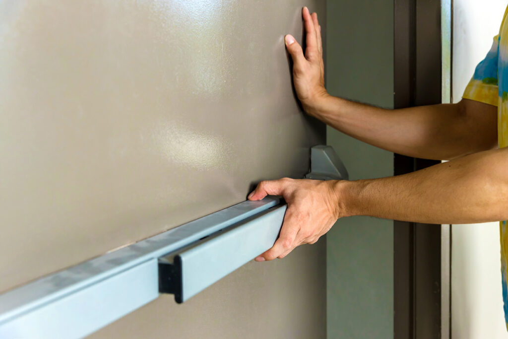 Man Opening Fire Door